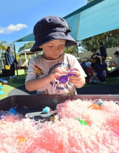 Sensory play - Easter eggs hidden in the hay