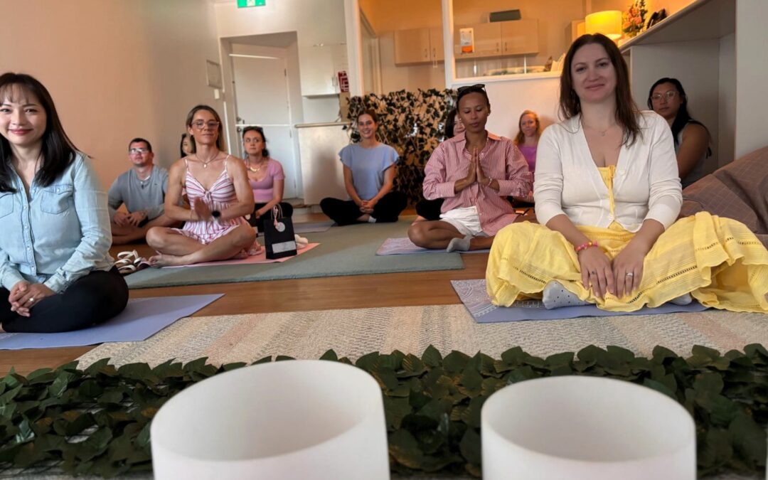 Mothers enjoying a relaxing sound bath during the Mother’s Day event at Enrich Early Education, a Gold Coast child care centre supporting family wellbeing.