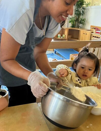 The toddlers baked cookies during a practical life skills activity.