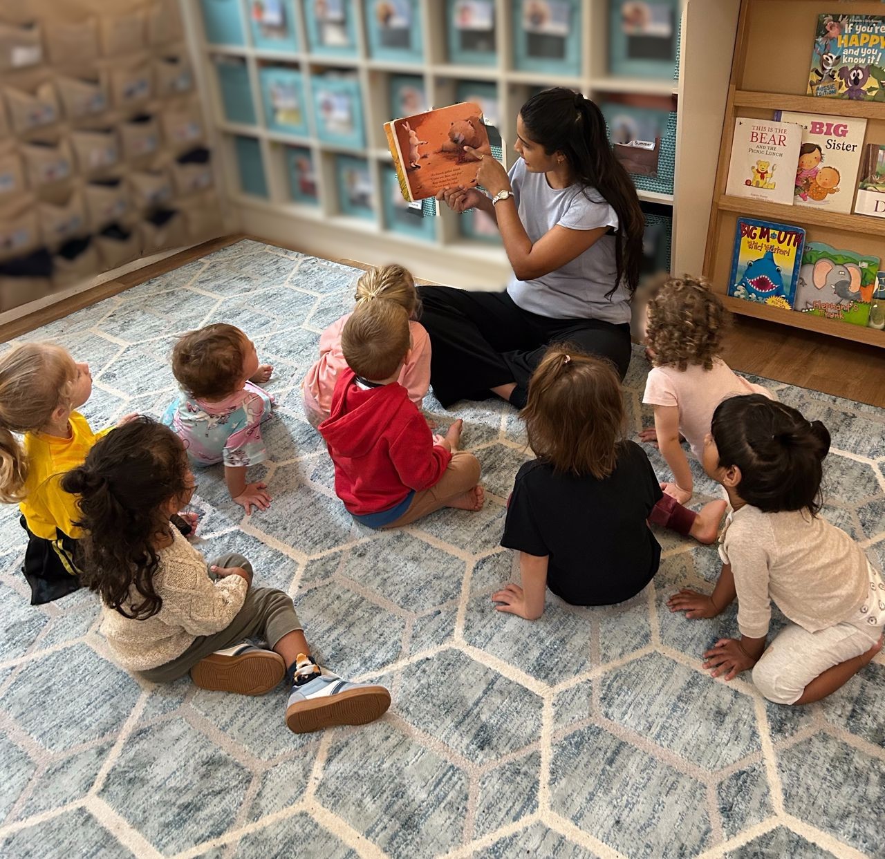 Reading a book during group time Reading a book during group time