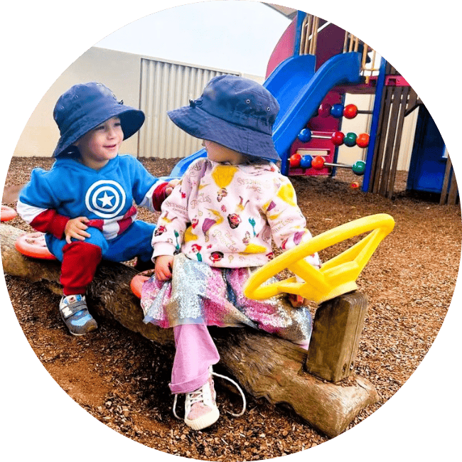 The children at Enrich daycare love playing on the wooden train. The children at Enrich daycare love playing on the wooden train.